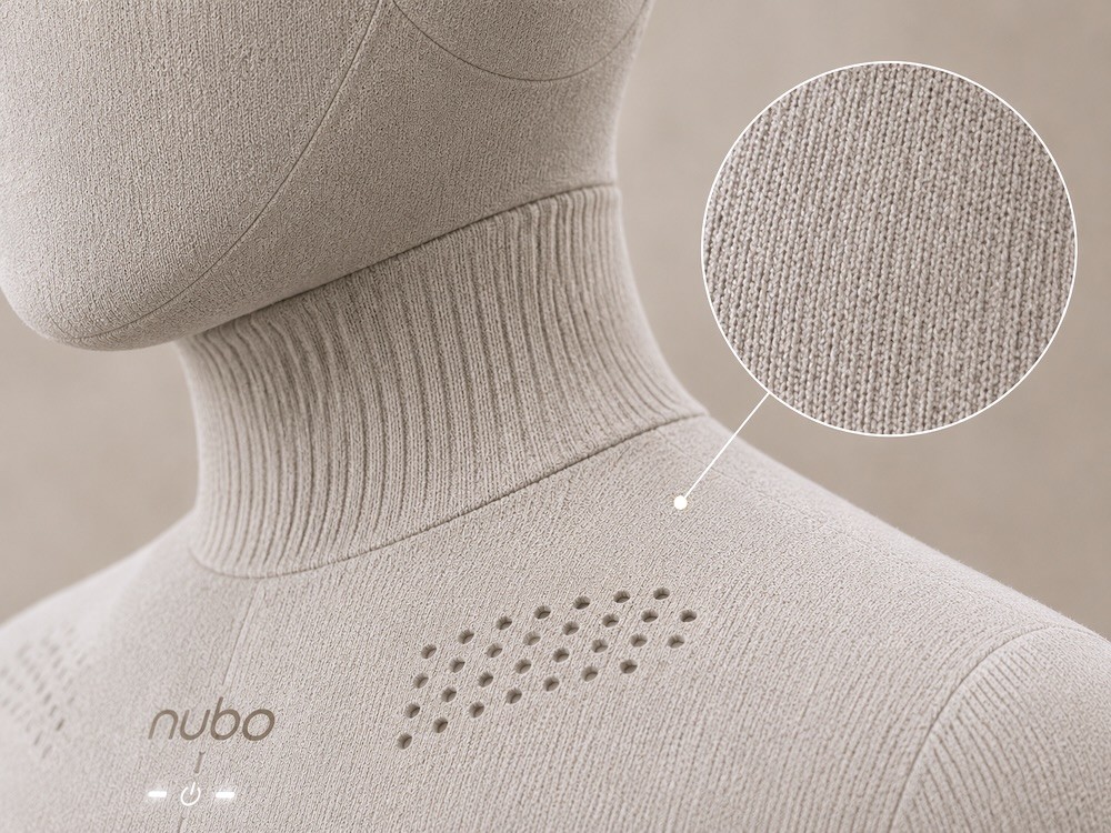 Close-up of Nubo turtleneck collar with magnified fabric texture detail and sensor dot grid on chest
